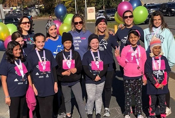 Carrie Mellage, our Vice President of Consumer Products, and her daughter Alexa coaching another season with Girls on the Run International, a program designed to inspire girls to be joyful, healthy, and confident (Carrie is second from right in the top row, and Alexa is beside her in the light-blue hoodie)